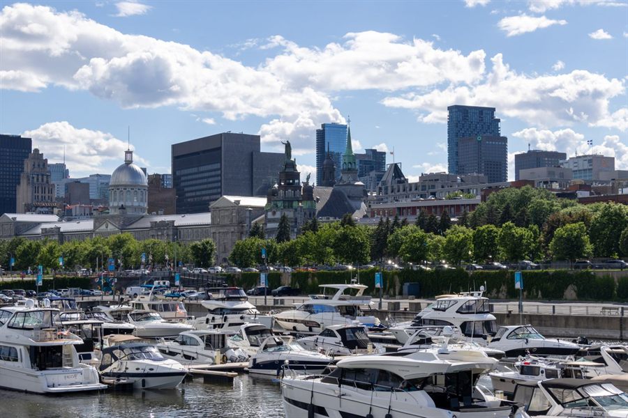 Montreal skyline above the Old Port marina on the St. Lawrence River, a start or finish for some Great Lakes cruises 2027