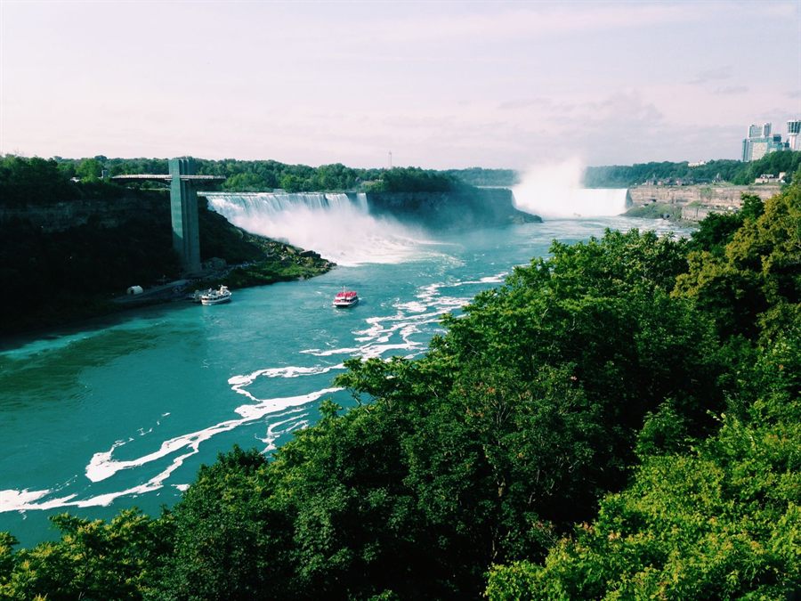 Niagara Falls and the gorge below seen from the green bluffs