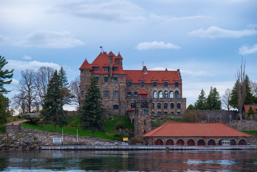 Singer Castle, a red-roofed stone mansion on an island in the St. Lawrence River