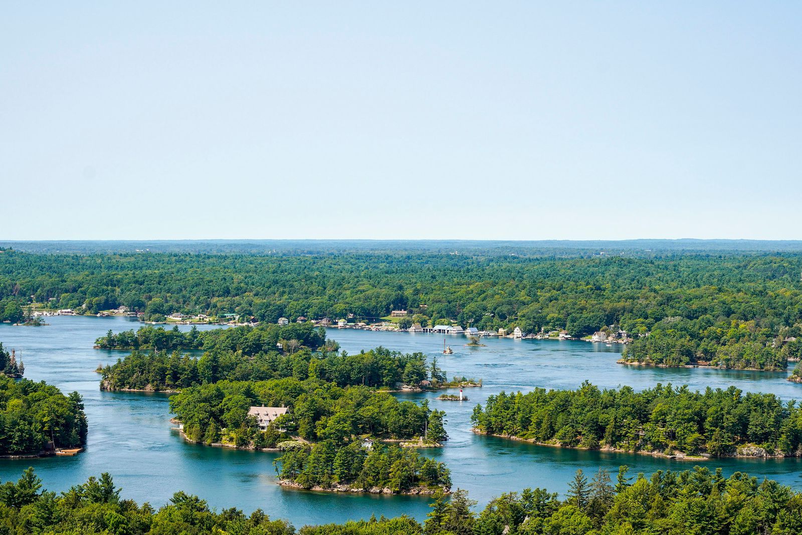 Aerial view of wooded islands scattered across the St. Lawrence River in the Thousand Islands